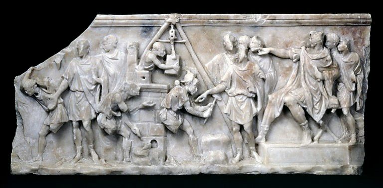 Relief with scenes of building